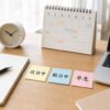 近日中と数日中と早急の違いを机のメモで整理する明るいデスクのイメージ