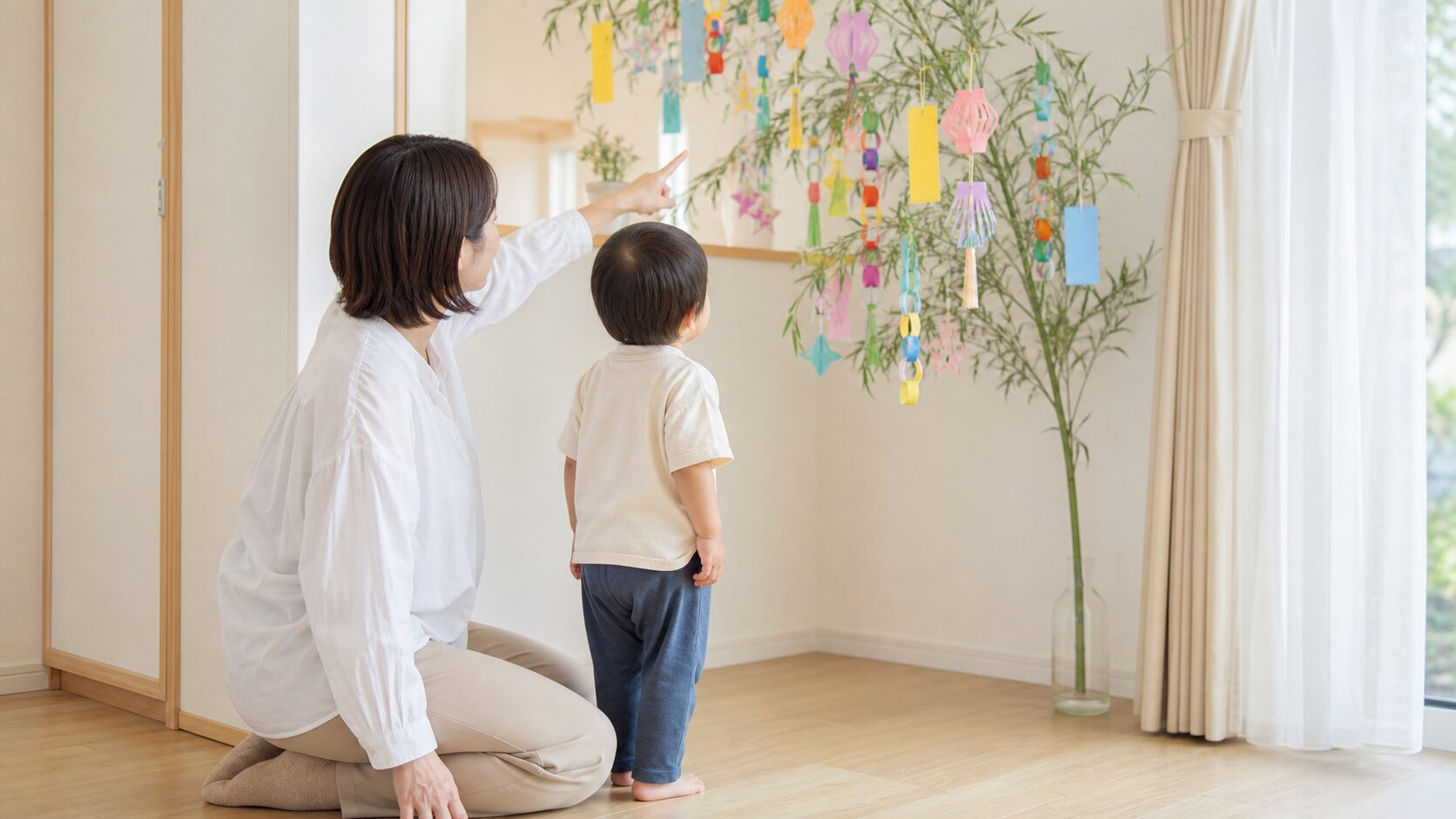 七夕飾りを子どもの手が届きにくい高さで確認するイメージ